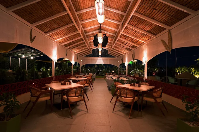 Rooftop dining tables at Stories Brew Garden